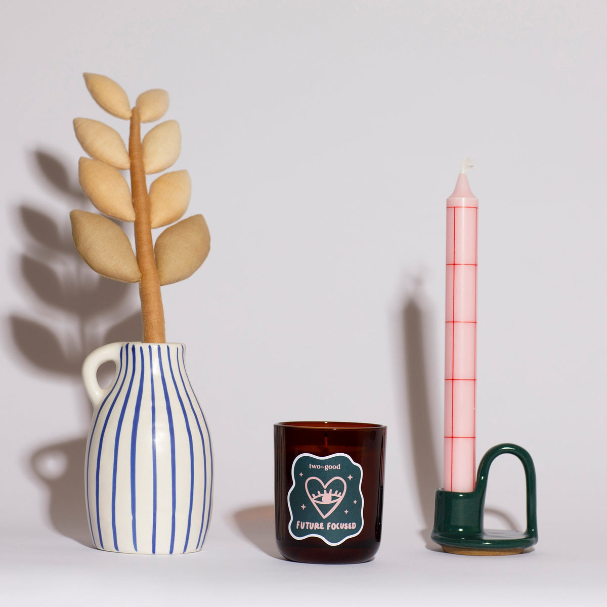 two~good Future Focused candle lit at home