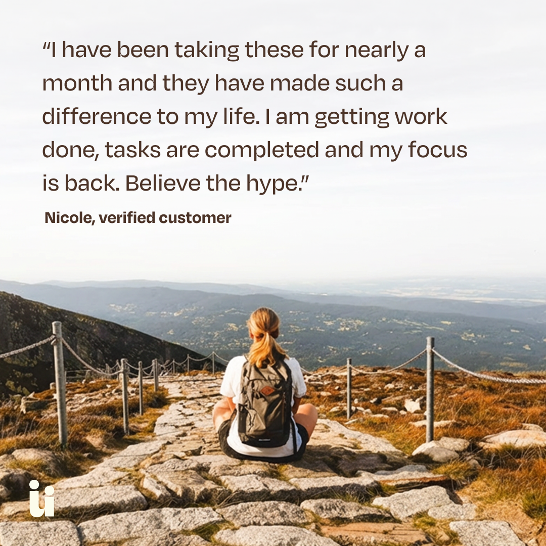 Person sitting on a mountain path with a scenic view, featuring a quote from a verified customer.